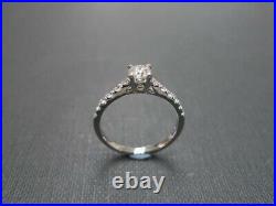 0.75 Ct Round Cut Lab-Created Diamond Women's Wedding Ring 14K White Gold Plated