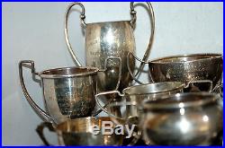 A COLLECTION OF 11 VINTAGE SILVER PLATED SPORTING TROPHY CUPS