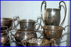 A COLLECTION OF 11 VINTAGE SILVER PLATED SPORTING TROPHY CUPS