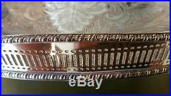 A beautiful vintage silver plated gallery tray with clawed legs. Very ornate
