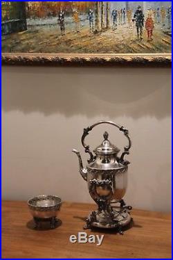 Antique 1920s vintage tilting teapot, silver plate over copper tea set
