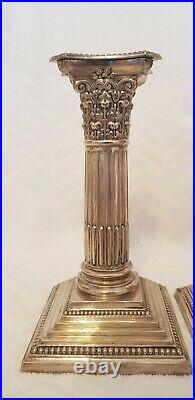 Antique Silver plated Weighted Pair Of Corinthian Column Candlesticks