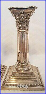 Antique Silver plated Weighted Pair Of Corinthian Column Candlesticks