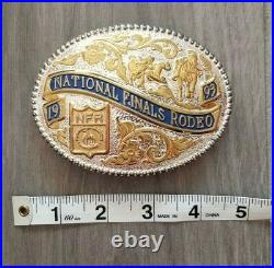 NFR PRCA NATIONAL FINALS RODEO 1993 Belt Buckle Silver Gold Plate Vintage Used