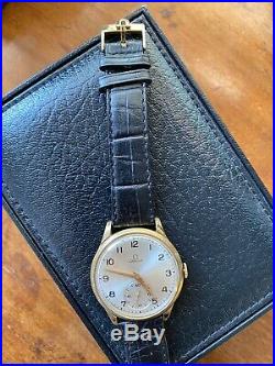 OMEGA VINTAGE GOLD PLATED HAND WIND MECHANICAL WATCH CIRCA 1950s