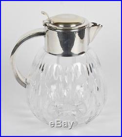 VINTAGE OCCUPIED GERMAN CUT CRYSTAL AND SILVERPLATE PITCHER With GLASS ICE INSERT