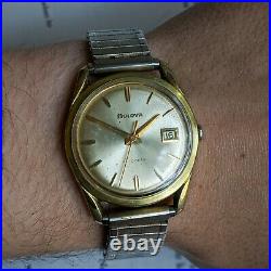 Vintage Bulova Men's automatic watch, gold plated case, champagne dial, working