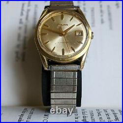 Vintage Bulova Men's automatic watch, gold plated case, champagne dial, working