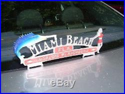 Vintage automobile Miami beach Florida license plate topper nos GM mercury ford