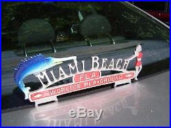 Vintage automobile Miami beach Florida license plate topper nos GM mercury ford
